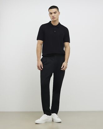 Svart slim fit-stickad polotröja