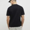 Svart slim fit-T-shirt med MCMXII-märke