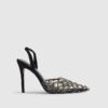 Svart slingback-klack med nitar i perspex