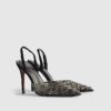 Svart slingback-klack med nitar i perspex