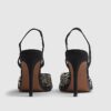 Svart slingback-klack med nitar i perspex