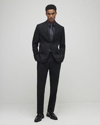 Svart stretchig slim fit-kostymbyxa Svart stretchig slim fit-kostymbyxa