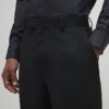 Svart stretchig slim fit-kostymbyxa