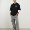 Svart T-shirt med internationella flaggor