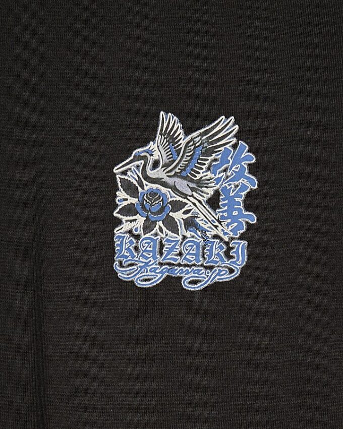 Svart T-shirt med oversized passform och Kazaki Crane-tryck