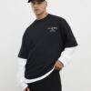 Svart T-shirt med oversized passform och Palais Dept-tryck