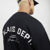 Svart T-shirt med oversized passform och Palais Dept-tryck