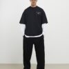 Svart T-shirt med oversized passform och Palais Dept-tryck