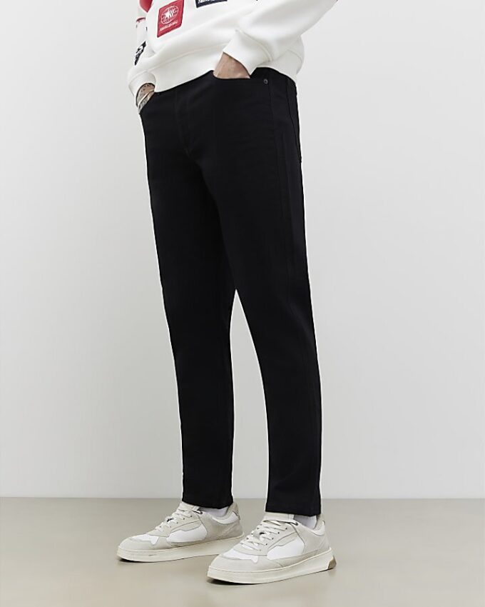 Svart tapered fit-jeans