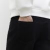 Svart tapered fit-jeans