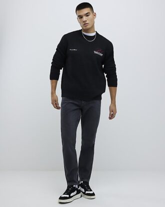 Svart tapered fit-tvättad jeans Svart tapered fit-tvättad jeans