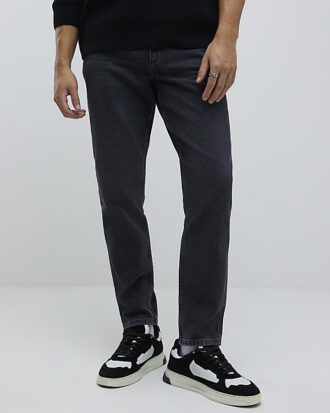 Svart tapered fit-tvättad jeans Svart tapered fit-tvättad jeans