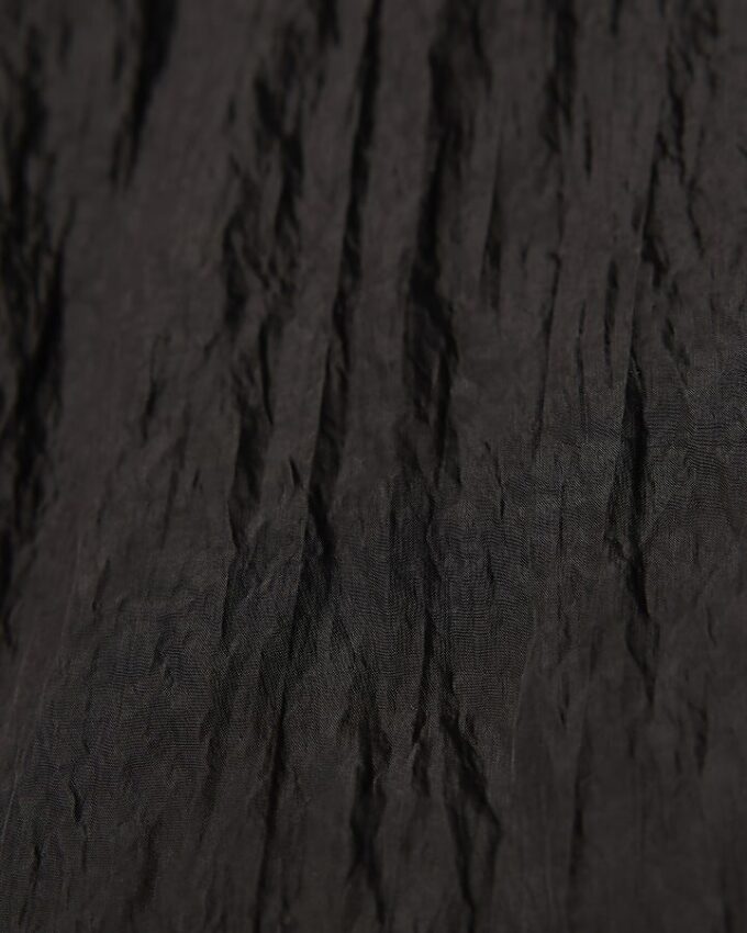 Svart texturerad byxa med raka ben