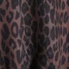 Svart topp med leopardmönster och knytband i sidorna