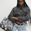 Svart totebag med daisy chain
