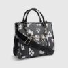 Svart totebag med daisy chain