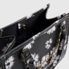 Svart totebag med daisy chain