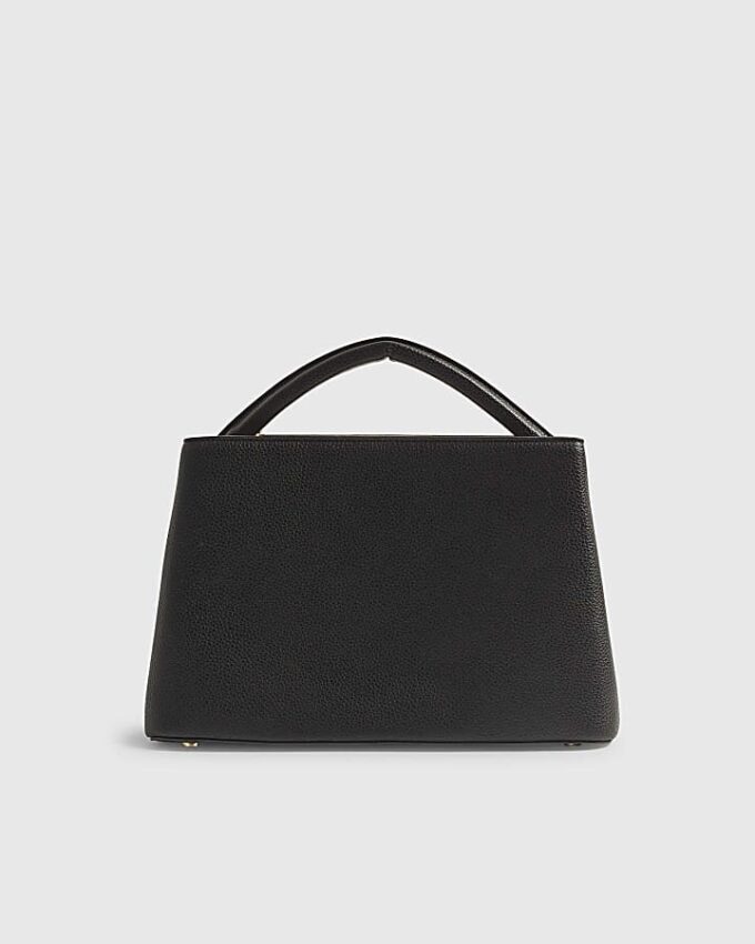 Svart totebag med ficka fram och charm