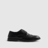 Svarta läderbrogues