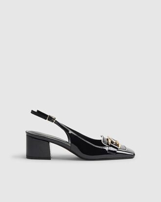 Svarta loafers med spänne och slingback-klack