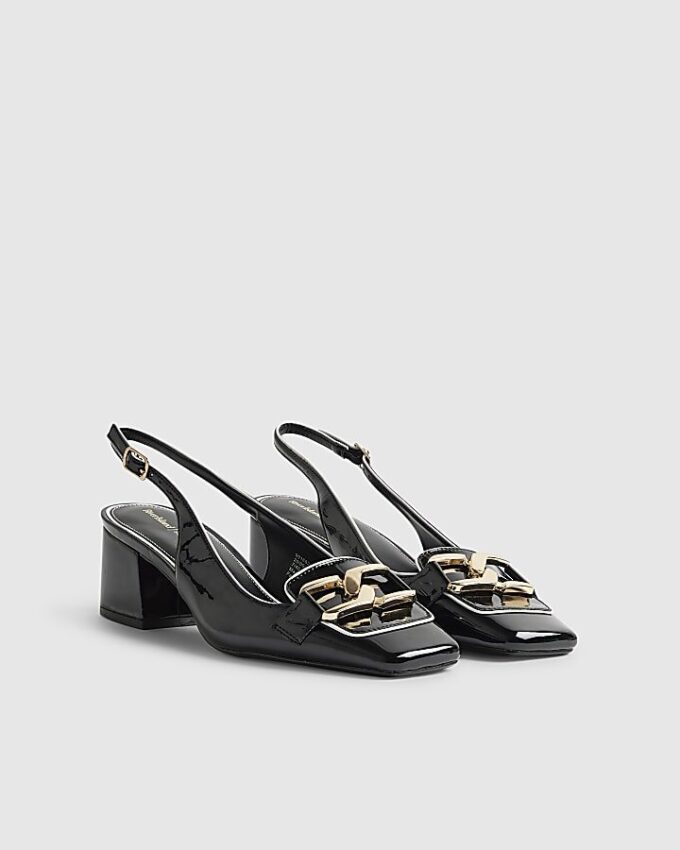 Svarta loafers med spänne och slingback-klack