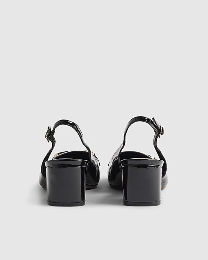 Svarta loafers med spänne och slingback-klack