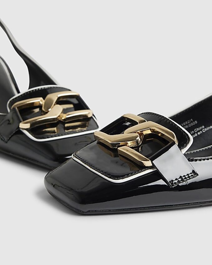 Svarta loafers med spänne och slingback-klack