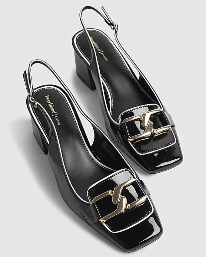 Svarta loafers med spänne och slingback-klack