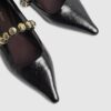 Svarta platta pumps med nitar