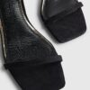 Svarta sandaler med remmar och klack