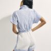 Vit broderad playsuit med patchwork-ränder