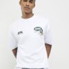 Vit oversized-passformad T-shirt med alpinbadge