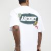 Vit oversized-passformad T-shirt med alpinbadge