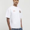 Vit oversized-passformad T-shirt med drakgraffiti