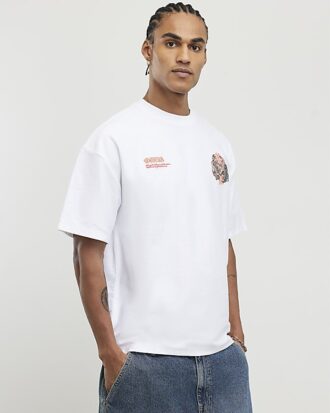 Vit oversized-passformad T-shirt med drakgraffiti