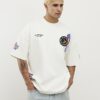 Vit oversized-passformad T-shirt med flera USA-märken
