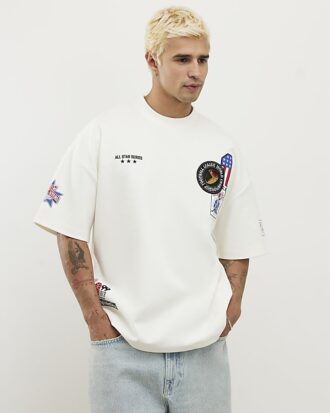 Vit oversized-passformad T-shirt med flera USA-märken