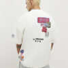 Vit oversized-passformad T-shirt med flera USA-märken