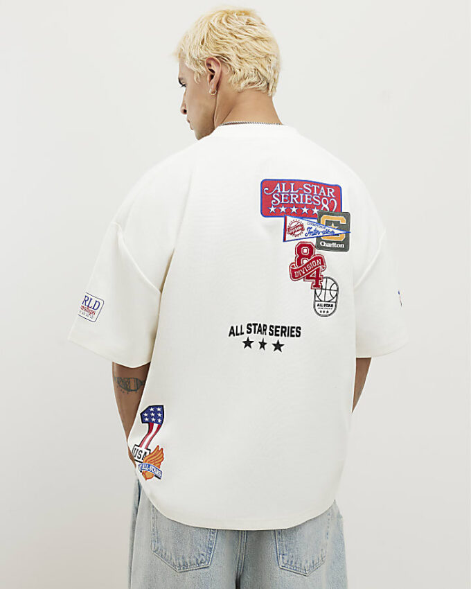 Vit oversized-passformad T-shirt med flera USA-märken
