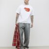 Vit oversized-passformad T-shirt med streckkodsetikett