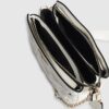 Vit quiltad crossbody-väska med monogram