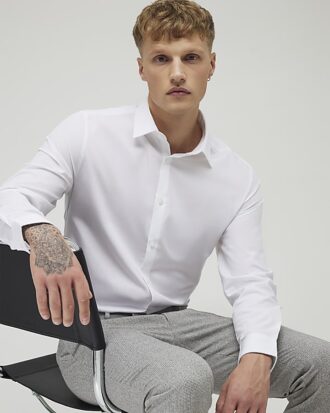 Vit slim fit-skjorta med långa ärmar Vit slim fit-skjorta med långa ärmar