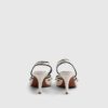 Vita pumps med piping och rosett bak