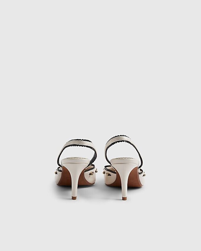 Vita pumps med piping och rosett bak