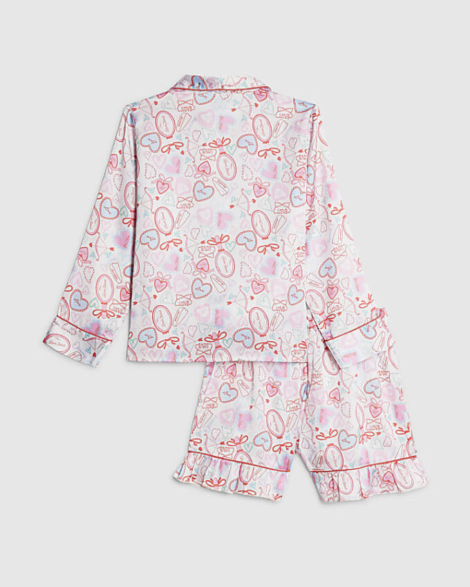 Vita satinpyjamasbyxor med hjärtmönster för flickor Vita satinpyjamasbyxor med hjärtmönster för flickor