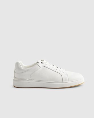 Vita sneakers med cup-sula