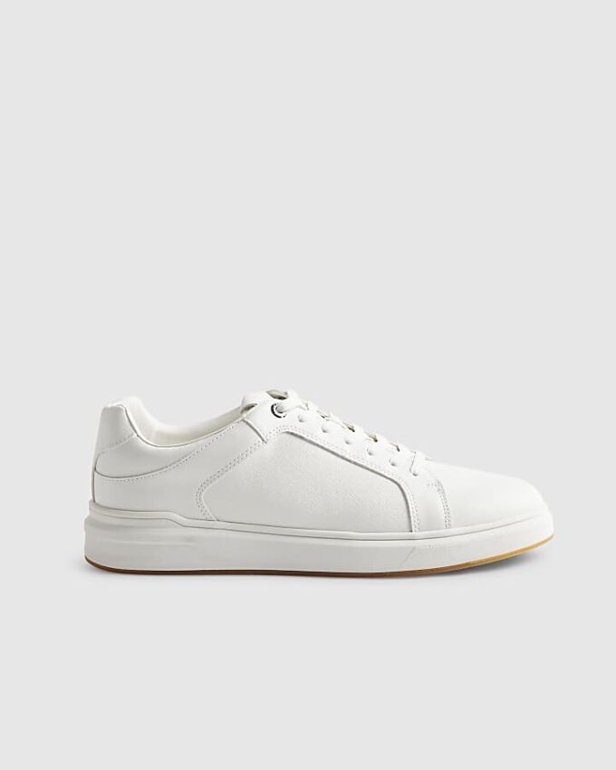 Vita sneakers med cup-sula