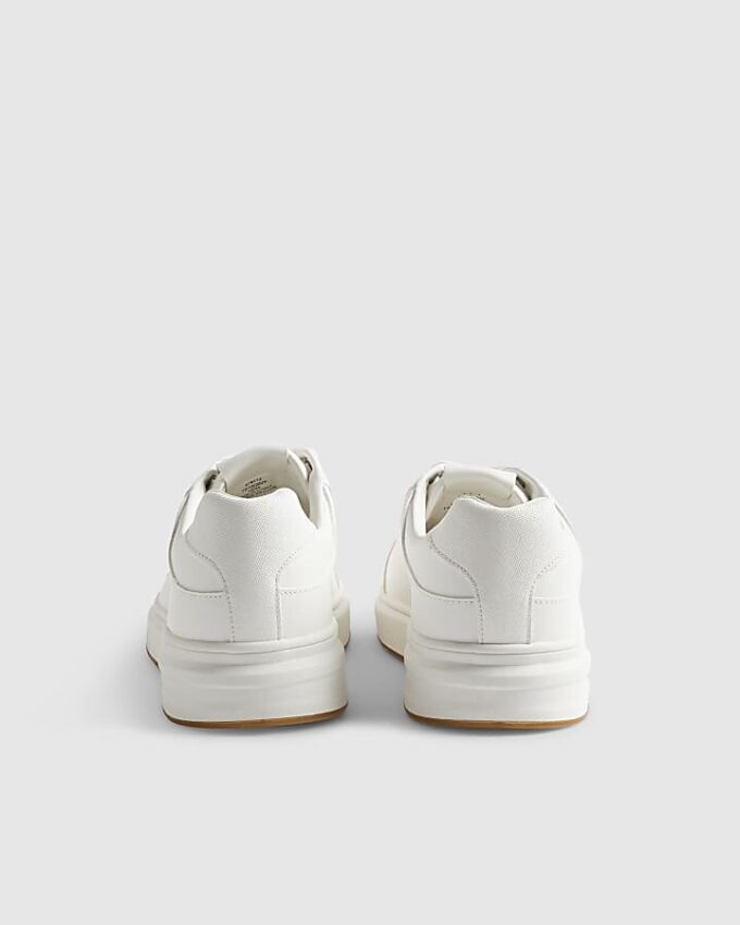 Vita sneakers med cup-sula