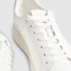 Vita sneakers med cup-sula